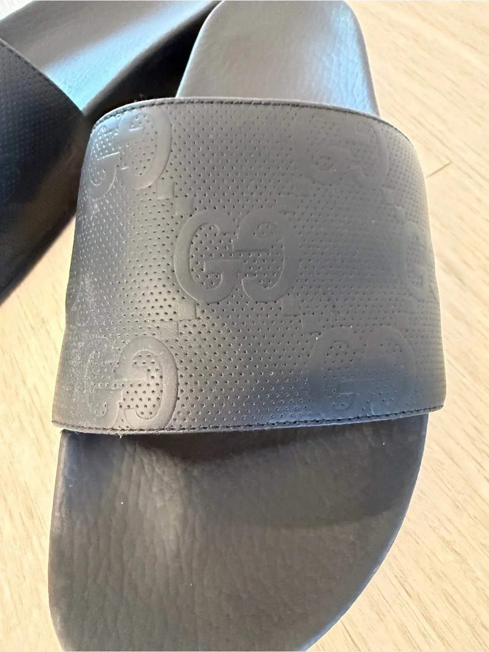 Men’s Gucci Black Embossed GG Slide Sandals